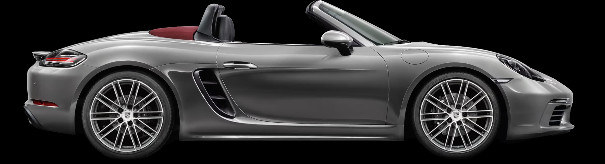 Porsche 718 Boxster in Agate Grey Metallic in side view/in profile.