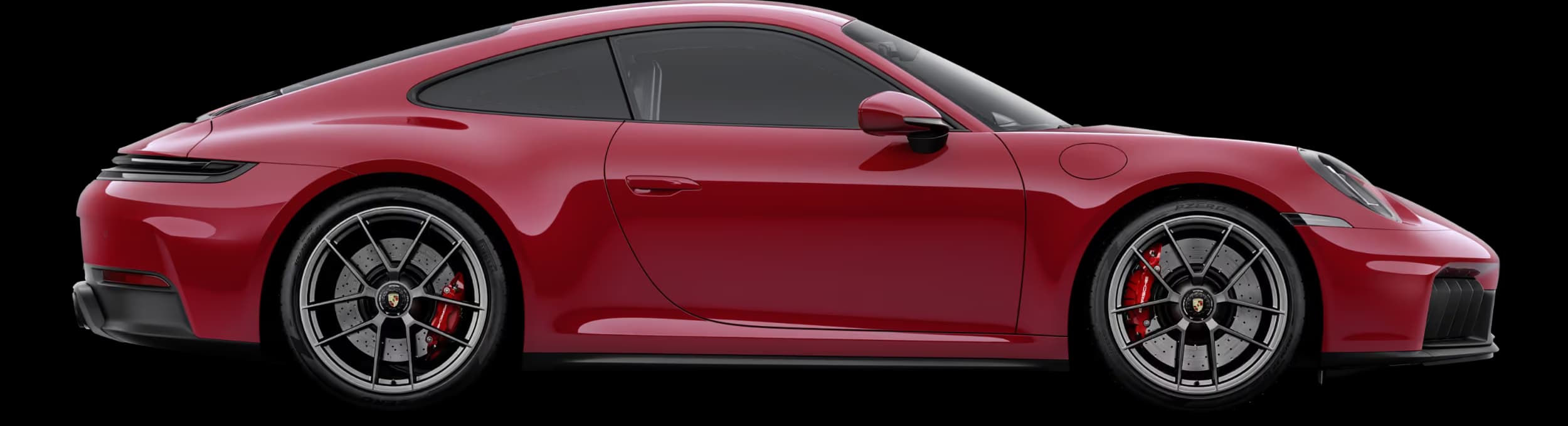 Porsche 911 Carrera 4 GTS in Carmine Red in profile/side view.