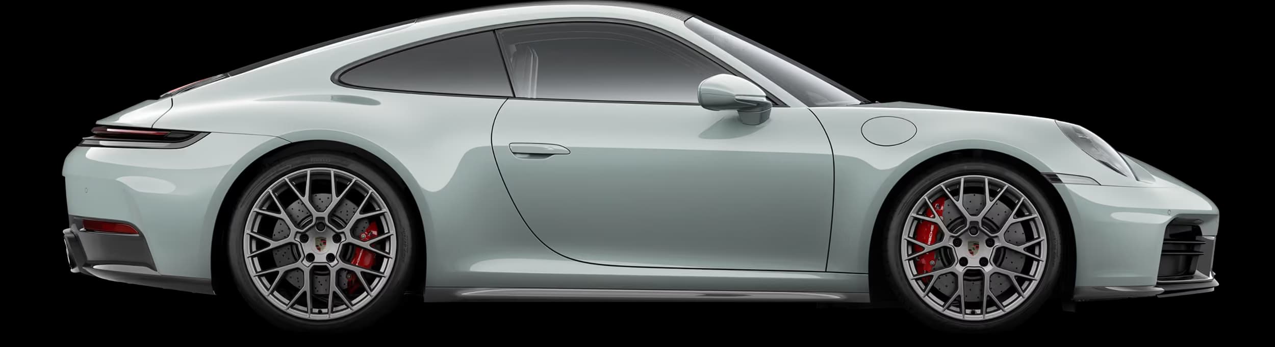 Profile or side view of the Porsche 911 Carrera 4S in Shade Green Metallic.